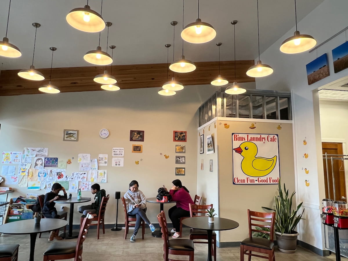 Cozy lounge seating and cafe area inside Bims Laundry Cafe, Everett WA